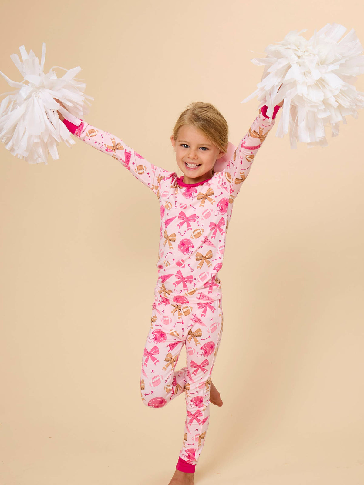 SoftSnooze™ Girls Bamboo Viscose Footballs & Bows Ruffle Long Sleeve Pajama Set