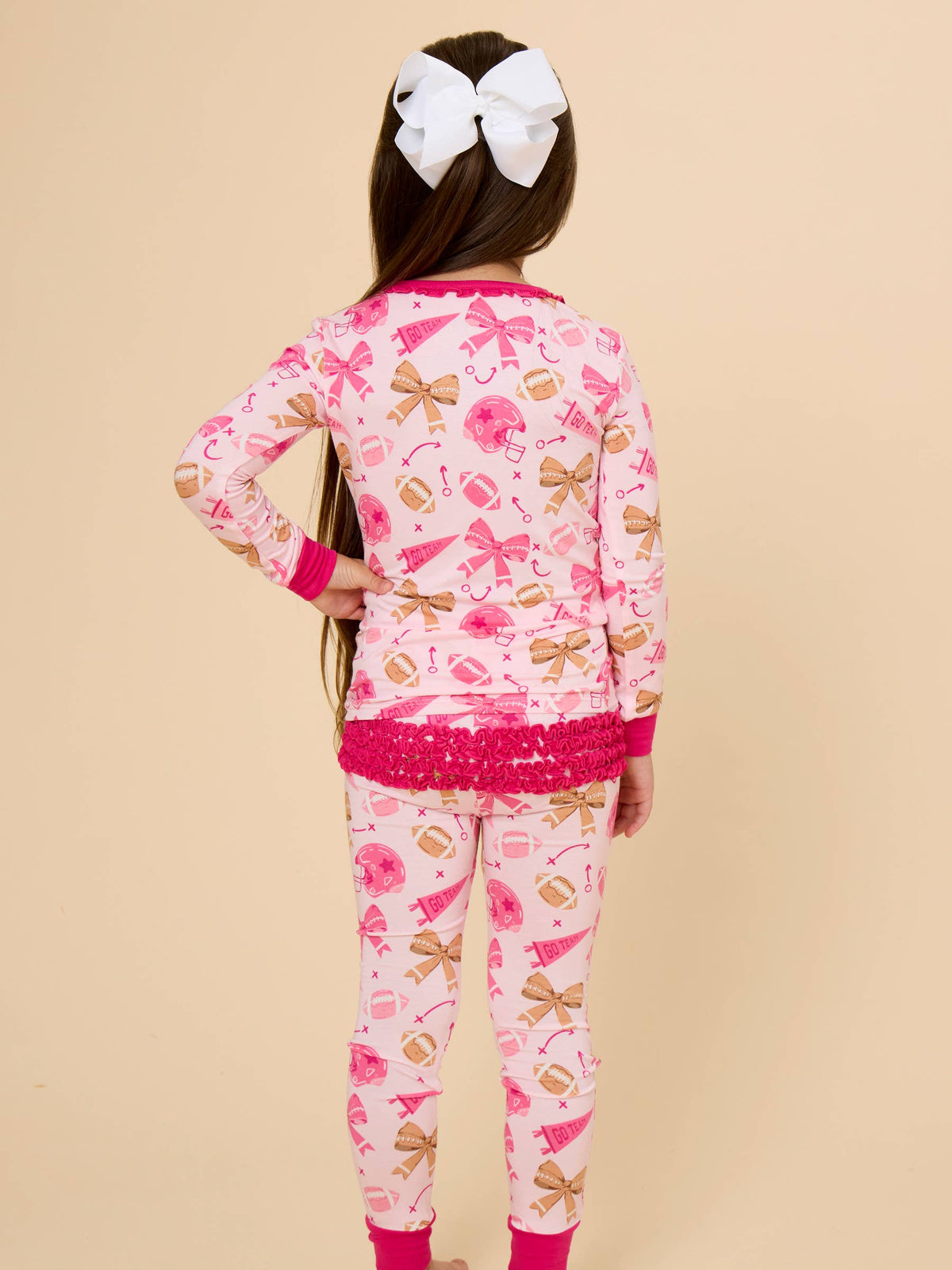 SoftSnooze™ Toddler Girls Bamboo Viscose Footballs & Bows Ruffle Long Sleeve Pajama Set with Signature Rear Ruffles