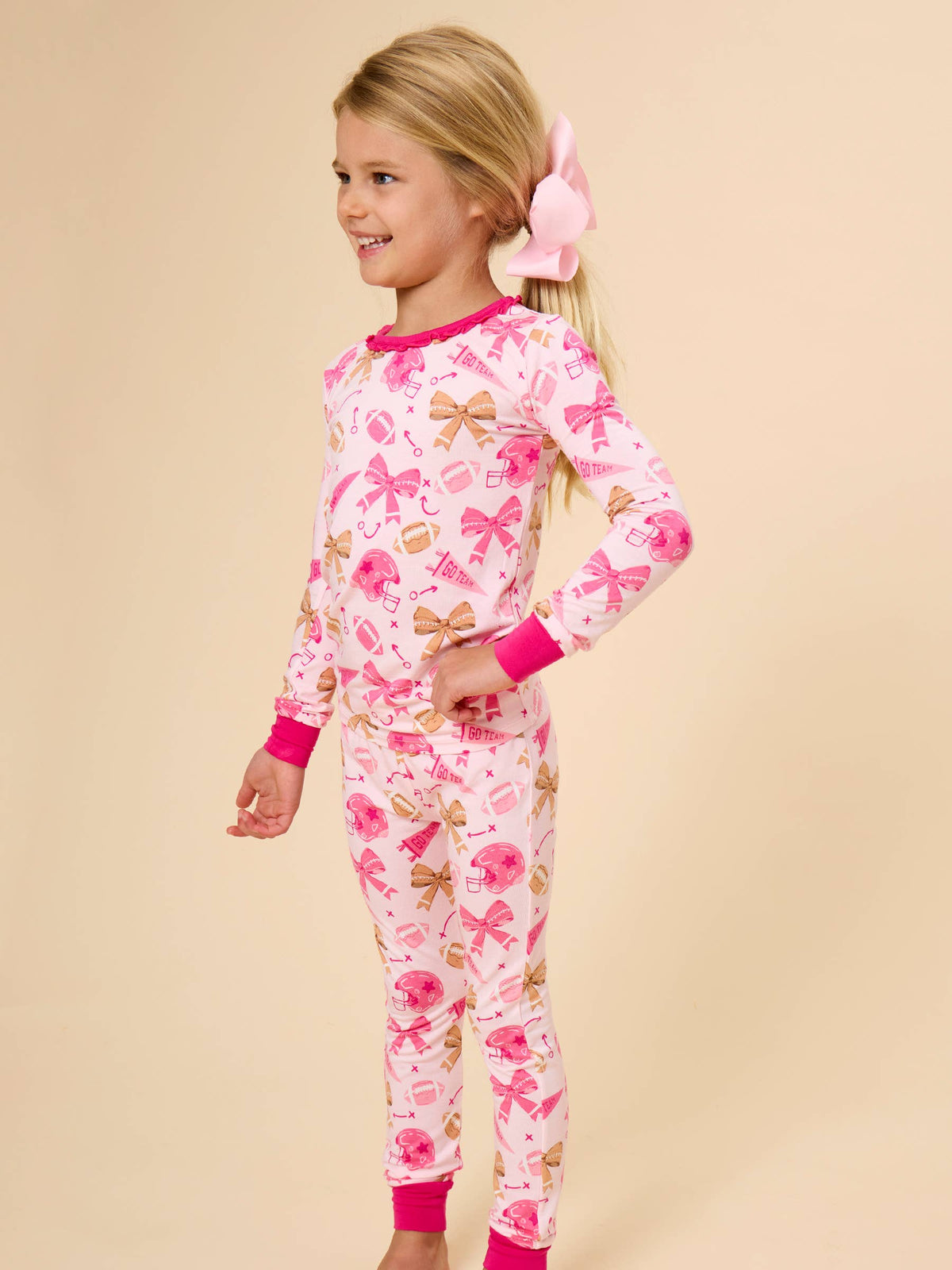 SoftSnooze™ Girls Bamboo Viscose Footballs & Bows Ruffle Long Sleeve Pajama Set
